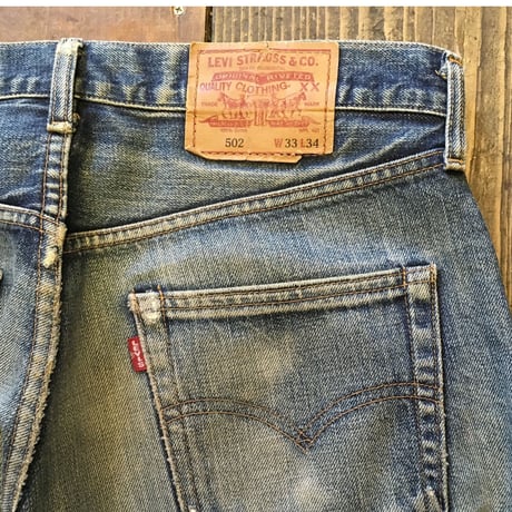[USED] Levis 502 'BIG E'レプリカ ダメージデニム
