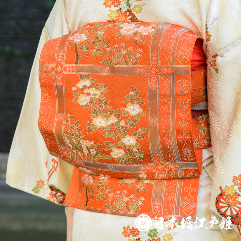 0305 名古屋帯 Aランク美品 正絹 オレンジ 格天井 草花 金糸 六通し 帯 