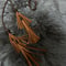 amulet string necklace