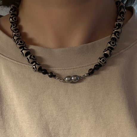 Black eye necklace