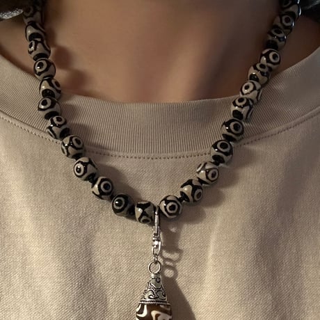 Black eye necklace