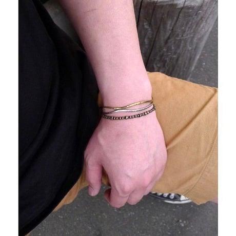真鍮とシルバーを波形に融合させたバングル