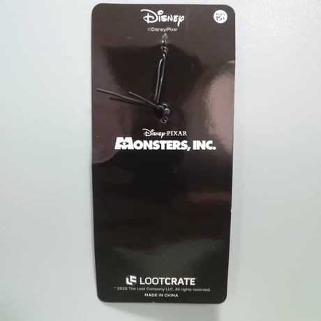 ピクサー『モンスターズインク』 "スケア・オブ・ザ・イヤー"メダル型キーチェーン