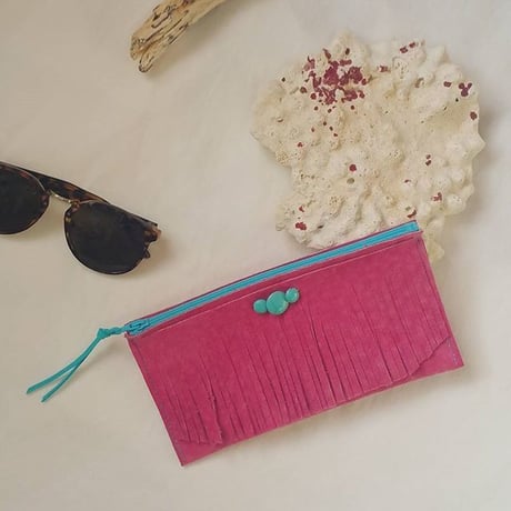 Pink leather pouch.