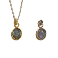 Carving labradorite charm