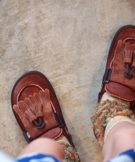 "SHAKA"MOC MULE TASSEL COWHAIR