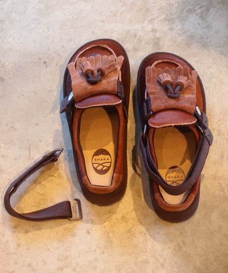 "SHAKA"MOC MULE TASSEL COWHAIR