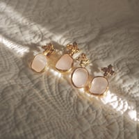 Cross × Pink girasol earrings