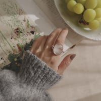 Crystal quartz revolving flow ring