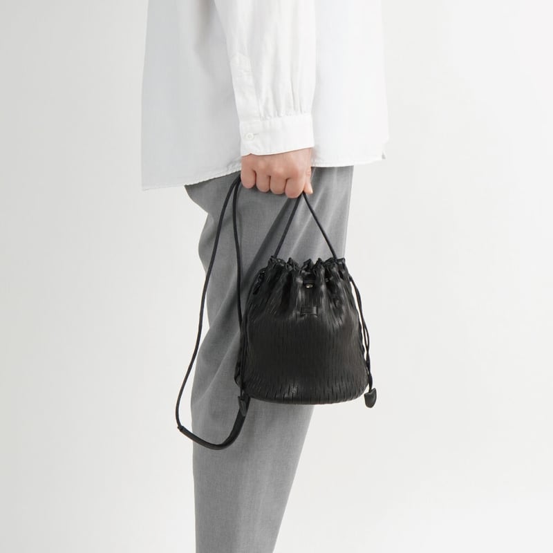 Bucket bag with net sales