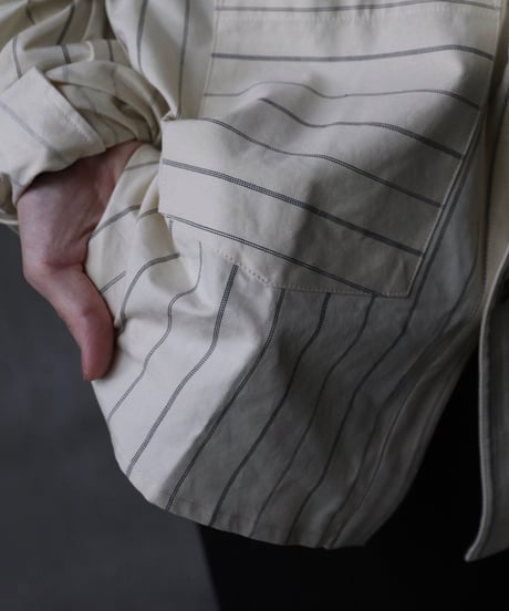 ALEKSANDR MANAMISアレクサンダーマナミ/ THREE POCKET ASYMMETRIC SHIRT JKシャツ/ am-21012