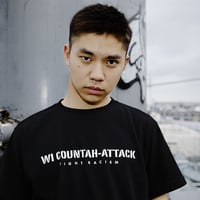 T-Shirt: Wi Countah-Attack - Fight Racism  (black with stickers)