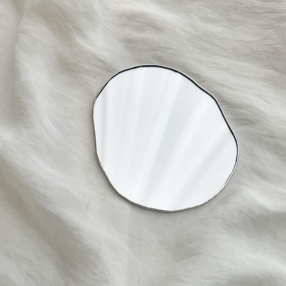 PUDDLE MIRROR PLATE / M / W115×H100 / FELT | do