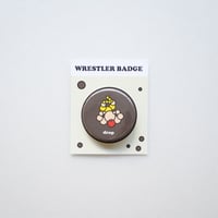 WRESTLER BADGE (drop)