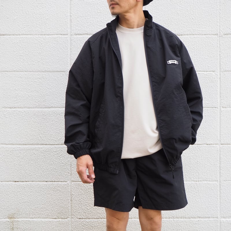 enough〈イナフ〉NYLON TRACK JACKET BLACK | e n o u g h enough〈イナフ〉NYLON TRACK JACKET BLACK | e n o u g h