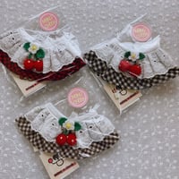 Mong’ncheek Cherry Checkcape