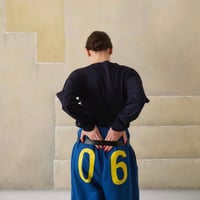 06th Anniv コラボレーションスウェットパンツ