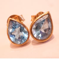 Blue topaz tear drop pierced earrings