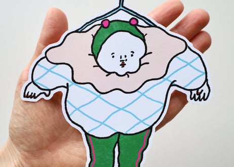 ダイカットカード「ハンガーに吊られる人」