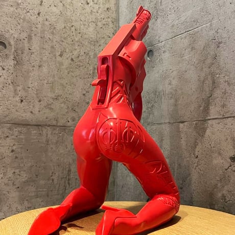 Let's Bang art sculpture (red)  by Tristan Eaton