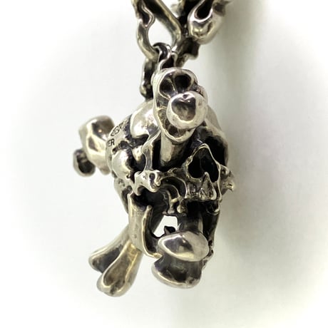 Bone Stab Skull Pendant