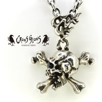 Bone Stab Skull Pendant