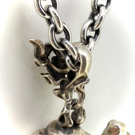 Bone Stab Skull Pendant