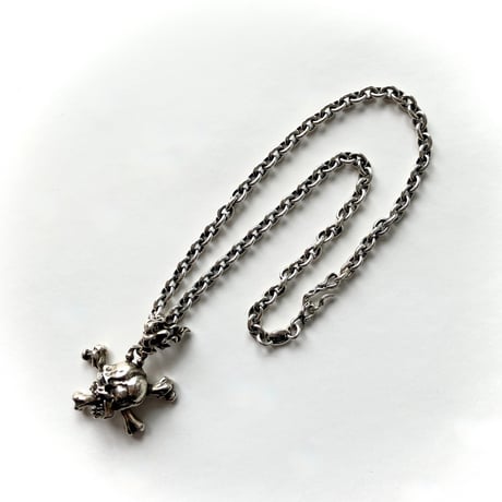 Bone Stab Skull Pendant