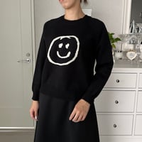 9-118     黒　ニコニコセーター　セレクト商品　フリー