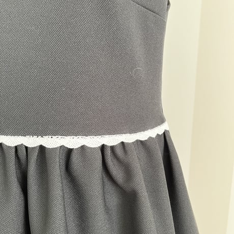 2-175     黒×胸スカラップ　ペプラムトップス　アシメ　ＭＬ