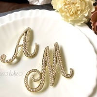 MandA initial pearl broach ping