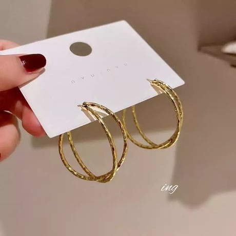W cross hoop pierce