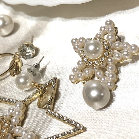 BIG pearl star asymmetry pierce