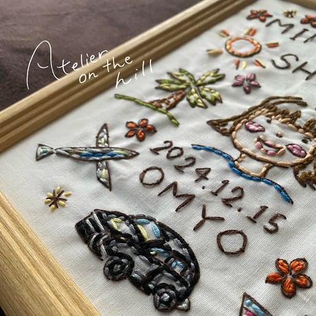 記念刺繍「MINNA SHIAWASE」
