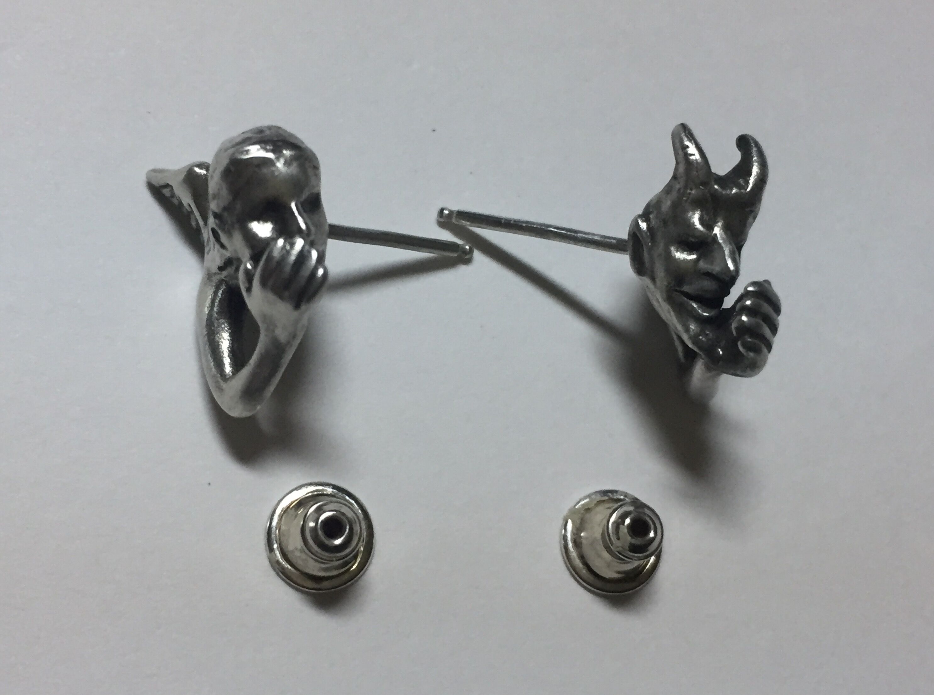 耳元で囁く悪魔と天使のピアス 耳元で囁く悪魔と天使のピアス | progressive art jewelry