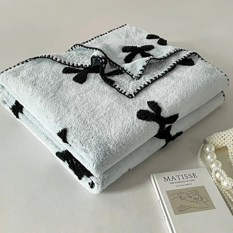 リボン付きブランケット手編み 8d0fb8b4eb9e6beeca7826dd450cc3