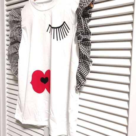 再入荷★ラッフルスリーブの女の子柄ノースリーブトップス ホワイト
