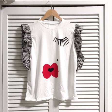 再入荷★ラッフルスリーブの女の子柄ノースリーブトップス ホワイト