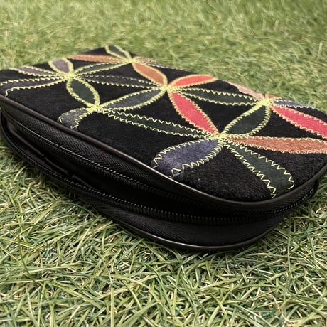 Flower embroidery pouch.