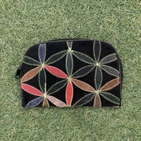 Flower embroidery pouch.
