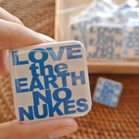 LOVE the EARTH NO NUKES tin badge
