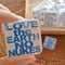 LOVE the EARTH NO NUKES tin badge