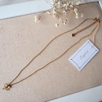 リボンチャーム付きネックレス