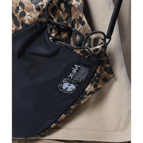 X-girl / FACE LABEL KNAPSACK