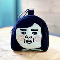 ブスの顔面ふわふわポーチ
