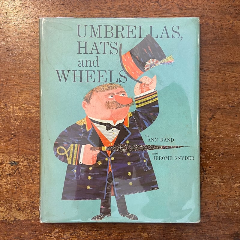UMBRELLAS, HATS and WHEELS」Ann Land Jerome Sny