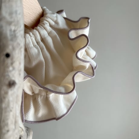frilly cape