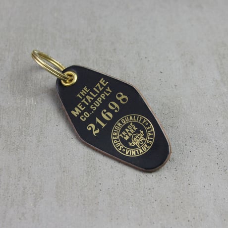 Hotel Vintage Bronzed leather card