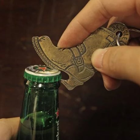 "There is a snake in my boot" Brass Opener Keyring