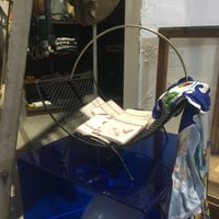MID CENTURY ROUND MAGAZINE RACK